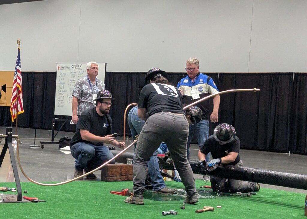 Conference attendees participating in popular water industry competitions and hands-on events at the 2026 AWWA PNWS Conference
