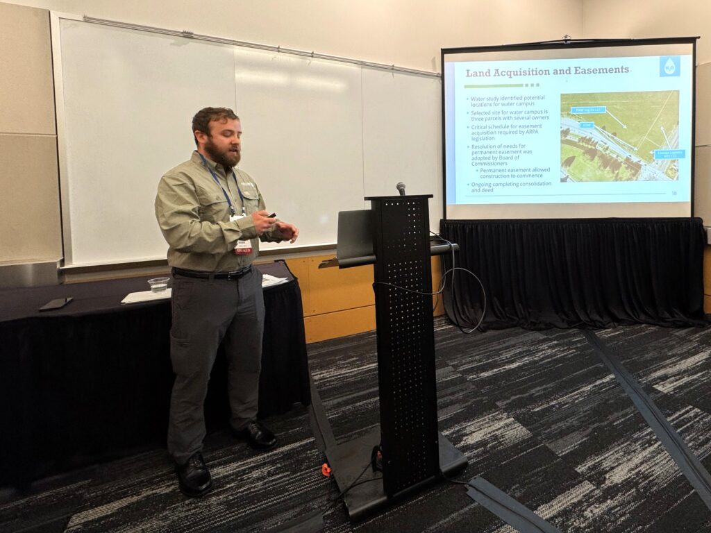 Zack Wallin, PE, leading a technical presentation during the 2026 AWWA Pacific Northwest Section Conference