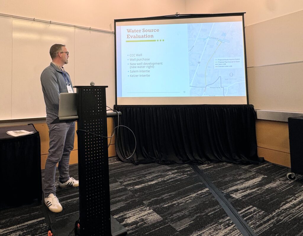 Peter Olsen, PE, presenting on water system planning and infrastructure resilience at the 2026 AWWA PNWS Conference